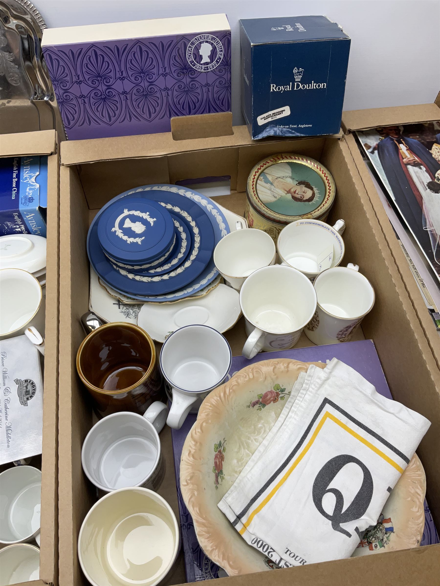 A large collection of commemorative ware, including Wedgewood Jasperware plates and trinket box for Royal silver jubilee, Shelley teacup and saucer for Edward VIII coronation, Bisto cups and saucers for George V and Queen Mary's coronation in 1911, loving cup, 1937 Coronation basket, thimbles, magazines and new cuttings etc. 