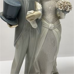 Two Lladro figures, comprising Matrimony no 1404 and Lady Golfer no 4851