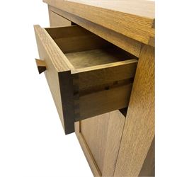 Solid oak sideboard, rectangular top, fitted with two drawers over two cupboards with wooden handles