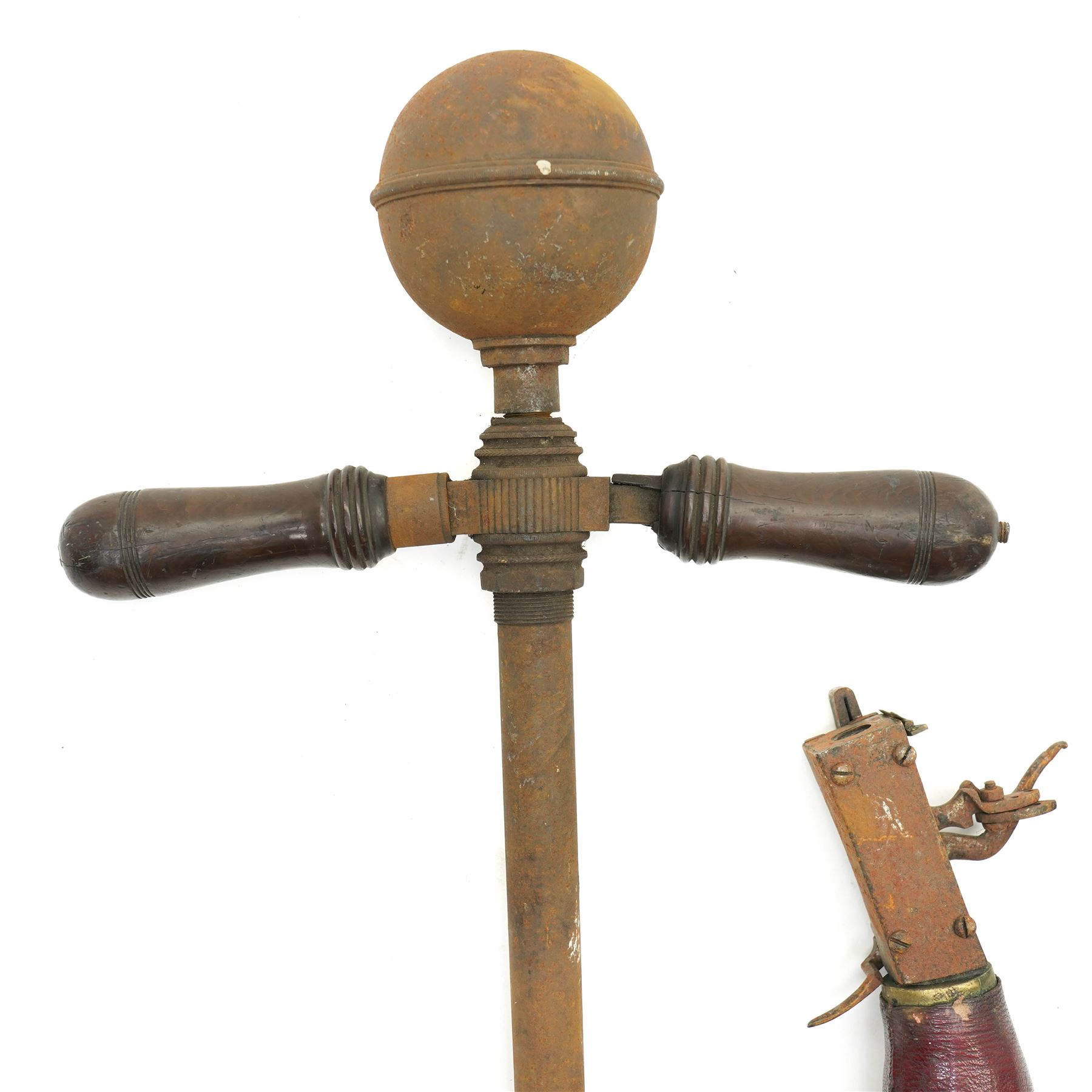 The remains of an 18th century air rifle, possibly German comprising red morocco covered butt and lock, pump with reservoir and spare reservoir 
Provenance: property of a Nobleman