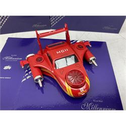 Royal Mail Millennium collection memorabilia, including presentation packs, with the essential guide books and various Corgi diecast vehicles 
