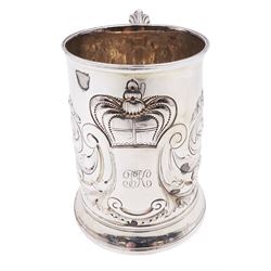 George III silver tankard, of slightly tapering cylindrical from, with chased and repousse crown above a monogrammed cartouche and floral, foliate and C scroll decoration, with acanthus capped C scroll handle, hallmarked WT, possibly William Turton, London 1774, H11.5cm