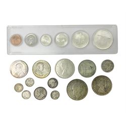 South Africa 1897 one shilling, 1967 one rand, Ireland 1928 two shillings and sixpence, Netherlands 1930 two and a half gulden, two Queen Elizabeth II Canada one dollar coins dated 1958 and 1964, 1967 six coin set in plastic holder etc