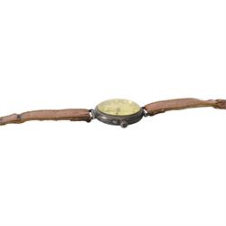 Silver cased trench watch enamel dial with Roman numerals, red XII, Longines movement, used in the Boer war, inscribed to the back 'E M Everitt From W.E Everitt 1882' 