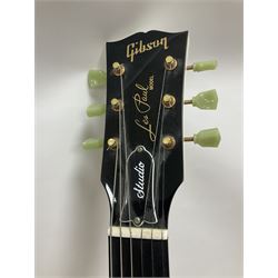 2010 Gibson Les Paul studio guitar, serial no101500537 in white finish with gold and pale green hardware, in Auden soft carry case, guitar L100cm