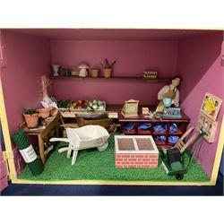 Three scratch-built wooden shop dioramas - single room Pet Shop with hinged front, fully furnished and well stocked with animals, birds and numerous accessories; and matching Garden Shop, fully furnished and well stocked with fruit, vegetables and garden accessories including lawn mower, wheelbarrows etc; each W34cm H27cm D26cm; and double fronted single room Butchers Shop with butcher at his block, partially stocked counter and two delivery cycles W57cm (3)