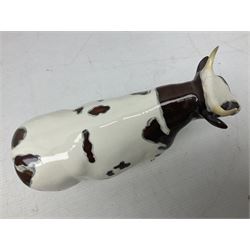 Five Beswick figures of cattle Comprising Ayrshire Bull Ch Whitehill Mandate, no 1454B, three Ayrshire Cow Ch Ickham Bessie, no 1350 and Ayrshire Calf, no 1249B, all with printed marks beneath