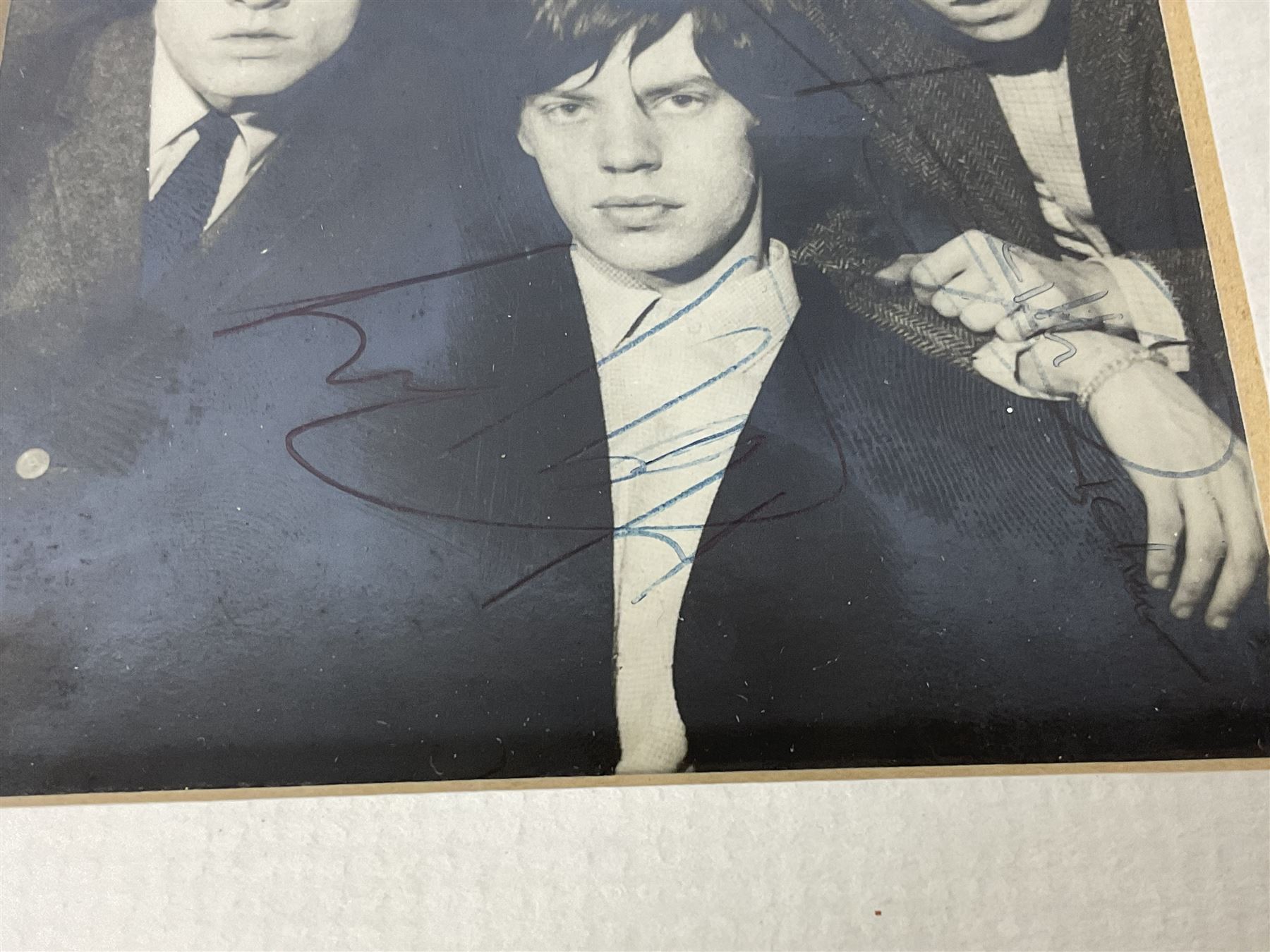 1960s autographed photographic postcard of The Rolling Stones showing Mick Jagger, Brian Jones, Keith Richard, Bill Wyman and Charlie Watts; signed in ink by all five members 13 x 9cm in modern mount and frame; together with a programme for the performance where the signatures were obtained supporting The Everly Brothers presumably at The Doncaster Gaumont as the date of this venue is hand written on the inside.