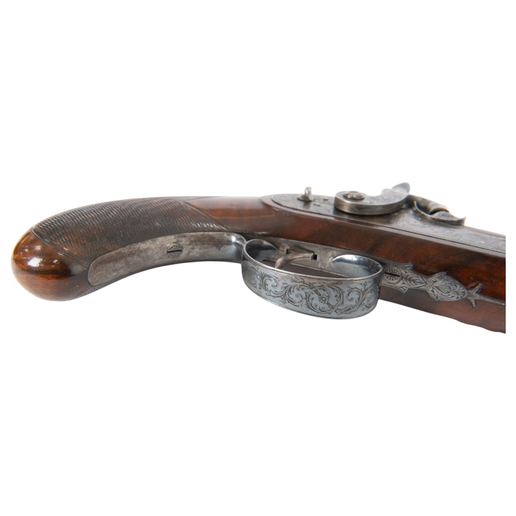 Pair of cased British officers' percussion cap dueling pistols by Braggs of London   (1932-1842), with 24cms octagonal Damascus steel sighted barrels with original browning, marked along the top Braggs 36 High Holborn London, ebony ramrods with steel caps and brass tips beneath, hammer, tang and trigger guard engraved with floral scrolls, figured walnut half stocks with chequered grips and vacant white metal cartouches, contained within a brass bound mahogany case with makers label to the lid, lined in green baize and containing bullet mould, powder flask, ram rod, percussion caps, case key and lead balls, pistol overall L40cm 