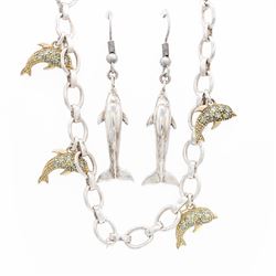 Silver oval link bracelet, with five 9ct gold Russian alexandrite set dolphin charms and a gold clasp, stamped 10K and a pair of silver dolphin earrings