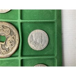 Coins and medallions including, York 1811 one shilling cattle and barber silver token, United States of America 1883O silver Morgan dollar, birds of destiny medal by Malcolm Appleby, Great British King George V 1930 halfcrown, King Edward VII 1902 silver medal, King George V 1916 halfcrown etc, housed in a case with lift out green coin trays