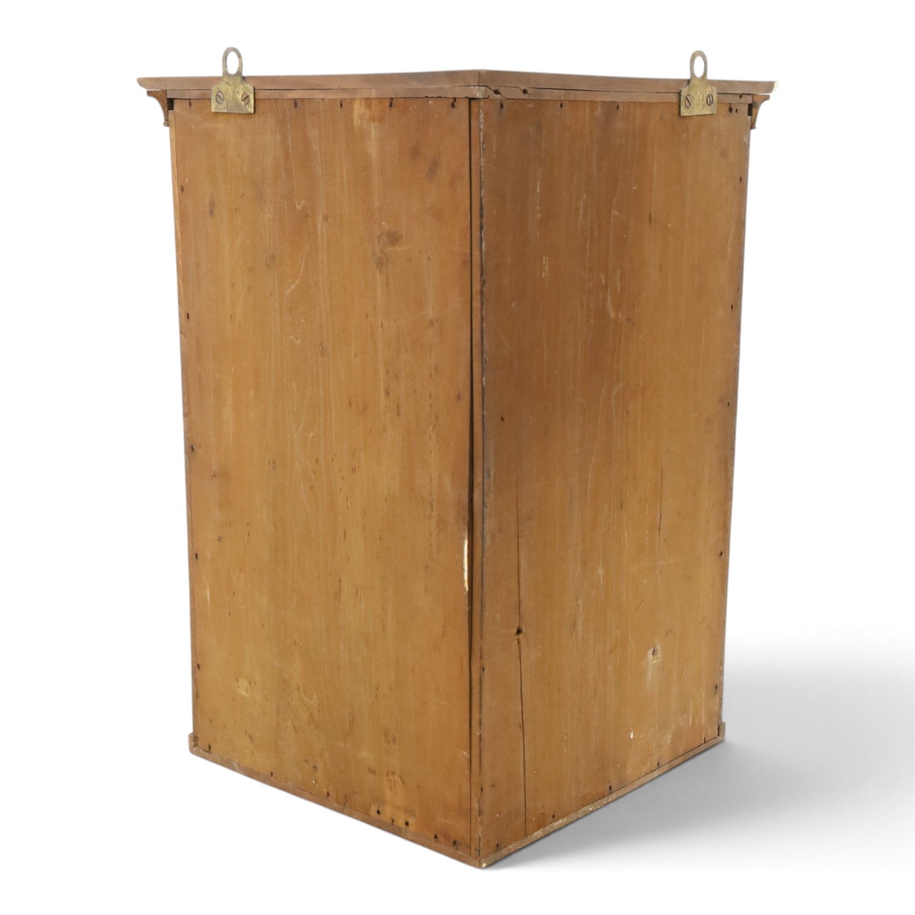 Edwardian walnut hanging corner cabinet, single panelled door with applied carved foliate decoration enclosing shelf 