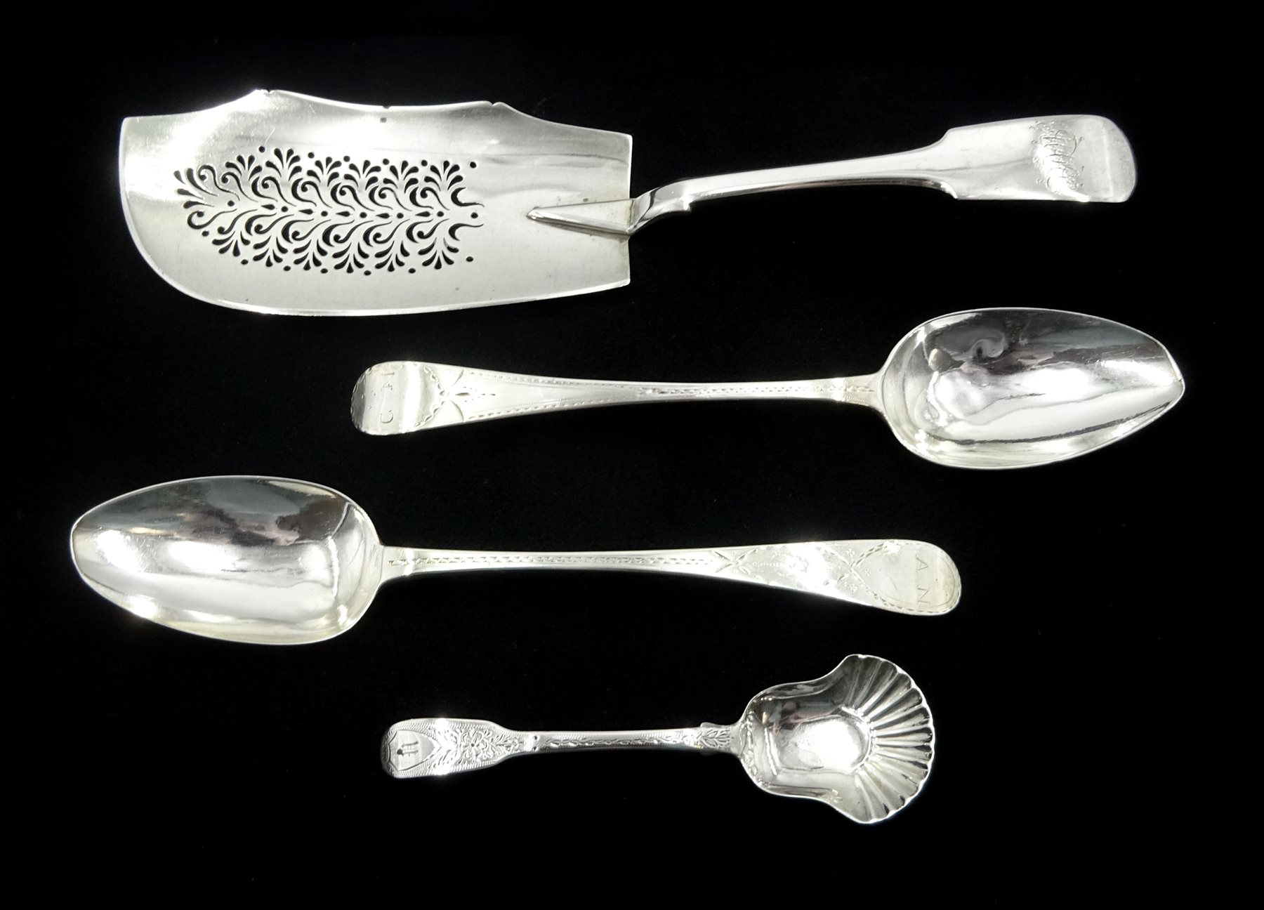 George IV silver fish server, Fiddle pattern by George Turner, Exeter 1825, silver caddy spoon by Sarah & John William Blake, London 1816 and two George III silver spoons by George Gray and Peter & Ann Bateman, approx 8.6oz