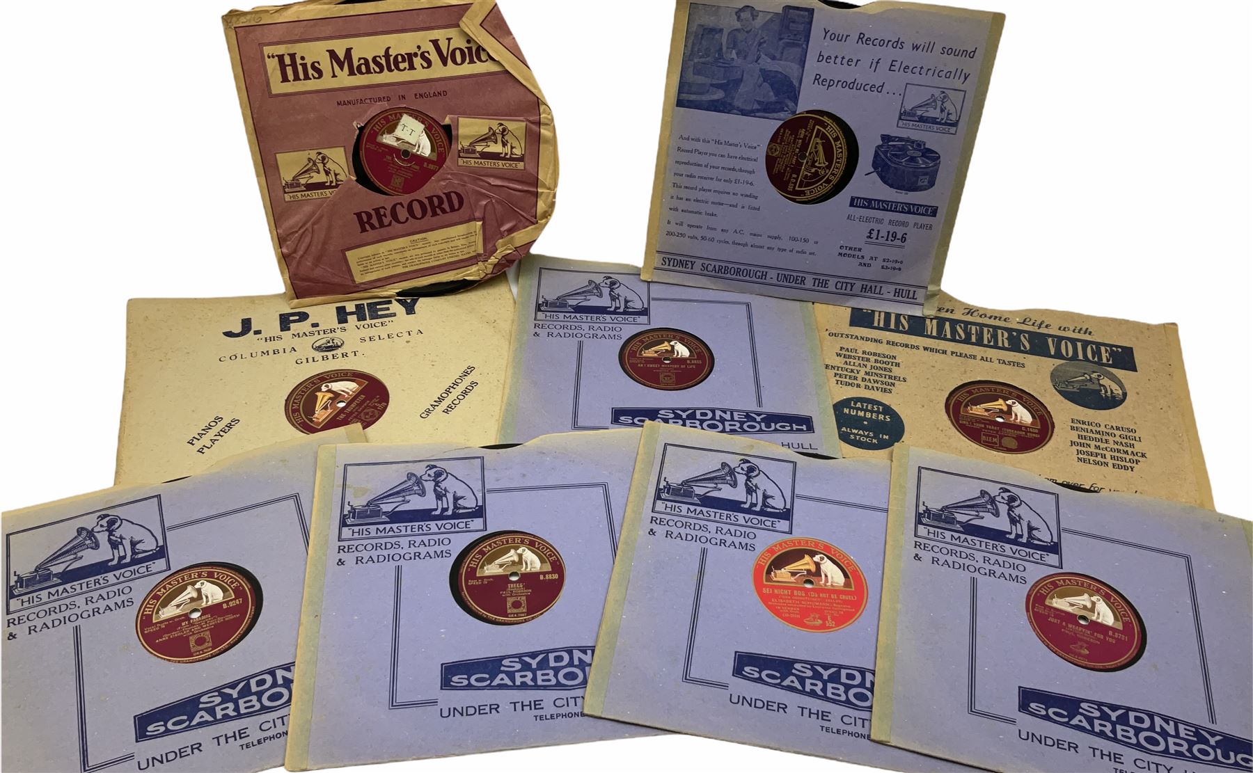 HMV portable wind up gramophone in a black case, together with a collection of records. 