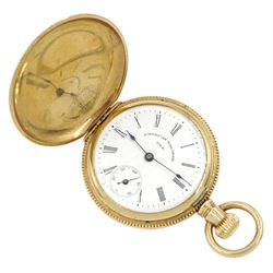 Early 20th century 10ct gold full hunter, keyless lever fob watch by American Watch Company, Waltham, No. 8551191, white enamel dial with subsidereary seconds dial and Roman numerals, the back case with gypsy set single stone old cut diamond and with beaded border, stamped 10K