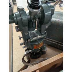 Two theodolites, comprising a Watts example in fitted hard case and a Cooke Troughton and Simms examplie in a wooden case, together with a Stanley dumpy level and a Hall and Watts surveyors measure