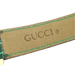 Gucci ladies gold-plated quartz wristwatch, Ref. 2600 L, silvered and green dial, on original green leather strap with gilt buckle, boxed