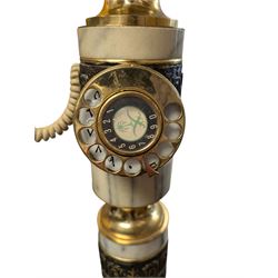 Tall Eastern brass and marble telephone, H105cm