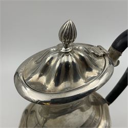 Five piece Edwardian silver tea service, comprising teapot and coffee pot, each with ebonised scroll handle, tea caddy with hinged cover, twin handled open sucrier, and milk jug, each of rounded bombe form, upon four paw feet, hallmarked William Adams Ltd, Birmingham 1904 and 1905, coffee pot H26cm
