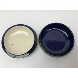 Moorcroft dish and cover, of circular form, decorated in Buttercup pattern, together with a Moorcroft vase, of baluster form, decorated in Magnolia pattern, both with printed marks beneath, tallest H9.5cm