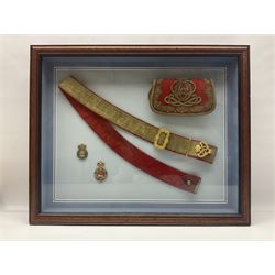 Victorian / Edward VII Queens Own Hussars Officers Full Dress Pouch and Cross Belt; scarlet cloth covered leather pouch with bullion embroidered crown, laurel bordered regimental crest within an edge of embroidered bullion wire; with its original officers cross belt with fine regimental pattern brocade to the top and gilt metal furniture; displayed in a wall hanging case with cloth and metal regimental badges; mahogany stained frame 44 x 54cm