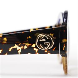 Gucci - pair of oversized round sunglasses, with gradient tinted lenses in a tortoiseshell-effect frame with blue and gold glitter inlay, the temples with interlocking gold-tone GG logo and bee motif, unused with original cloth and hard cases