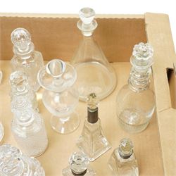 Glass atomiser with silver top, three glass scent flasks with silver collars, pair of cut glass globe scent flasks, other glass scent flasks and a 19th century etched glass liqueur decanter