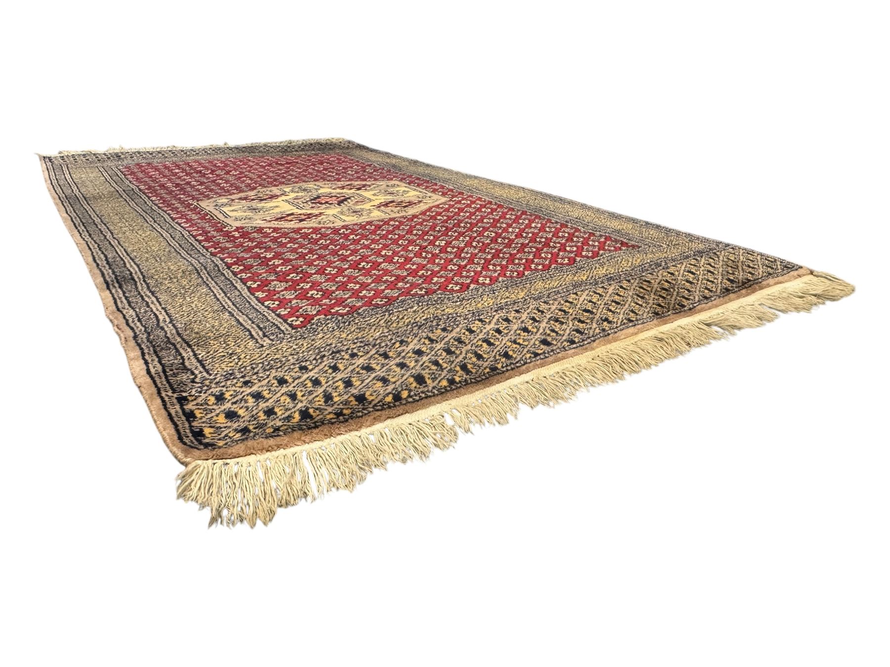 Pakistani Kashan hand-knotted rug with a central medallion and intricate geometric floral patterns, set against a red field and framed by a multi-band border (156 x 94cm); Pakistani Kashan rug with a repeating floral motif across the red field, enclosed by a detailed geometric border in complementary tones (162 x 95cm)