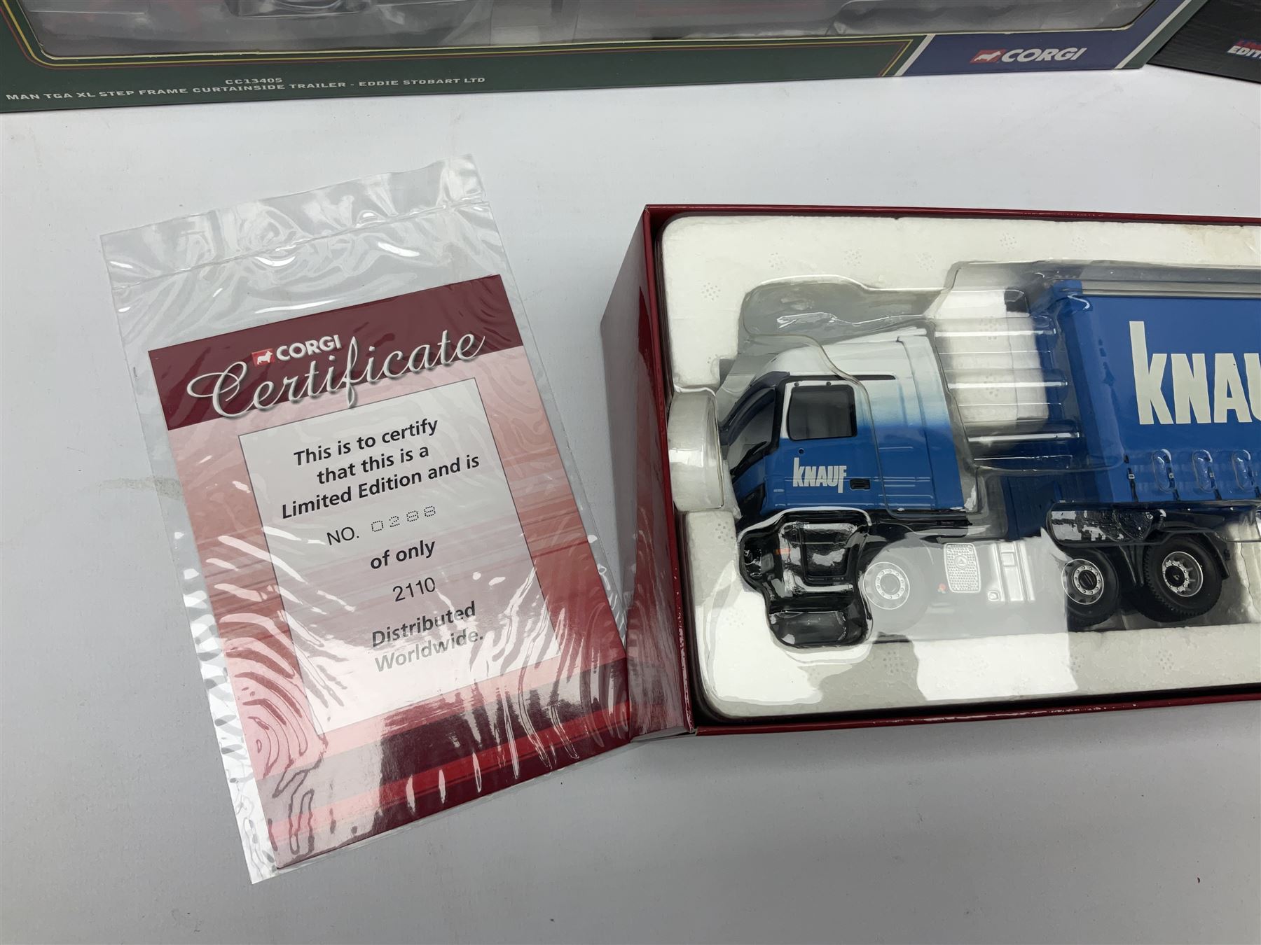 Corgi Eddie Stobart - three limited edition lorries; CC12936 Sight & Sounds Scania Topline Curtainside Trailer; CC13812 Hauliers of Renown Mercedes-Benz Actros Curtainside Knauf; and CC13405 MAN TGA XL Step Frame Curtainside Trailer; all boxed (3)