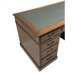 Early 20th century mahogany twin pedestal desk, fitted with nine drawers