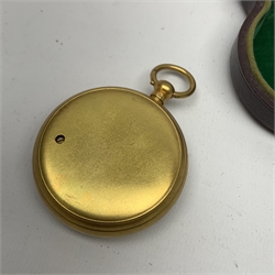 Early 20th century pocket barometer with gilt brass case, the white dial inscribed 'Compensated for Temperature No.G17536' and 'Harrods Ltd. Opticians London Made in Gt. Britain' 7.5cm, in outer carrying case