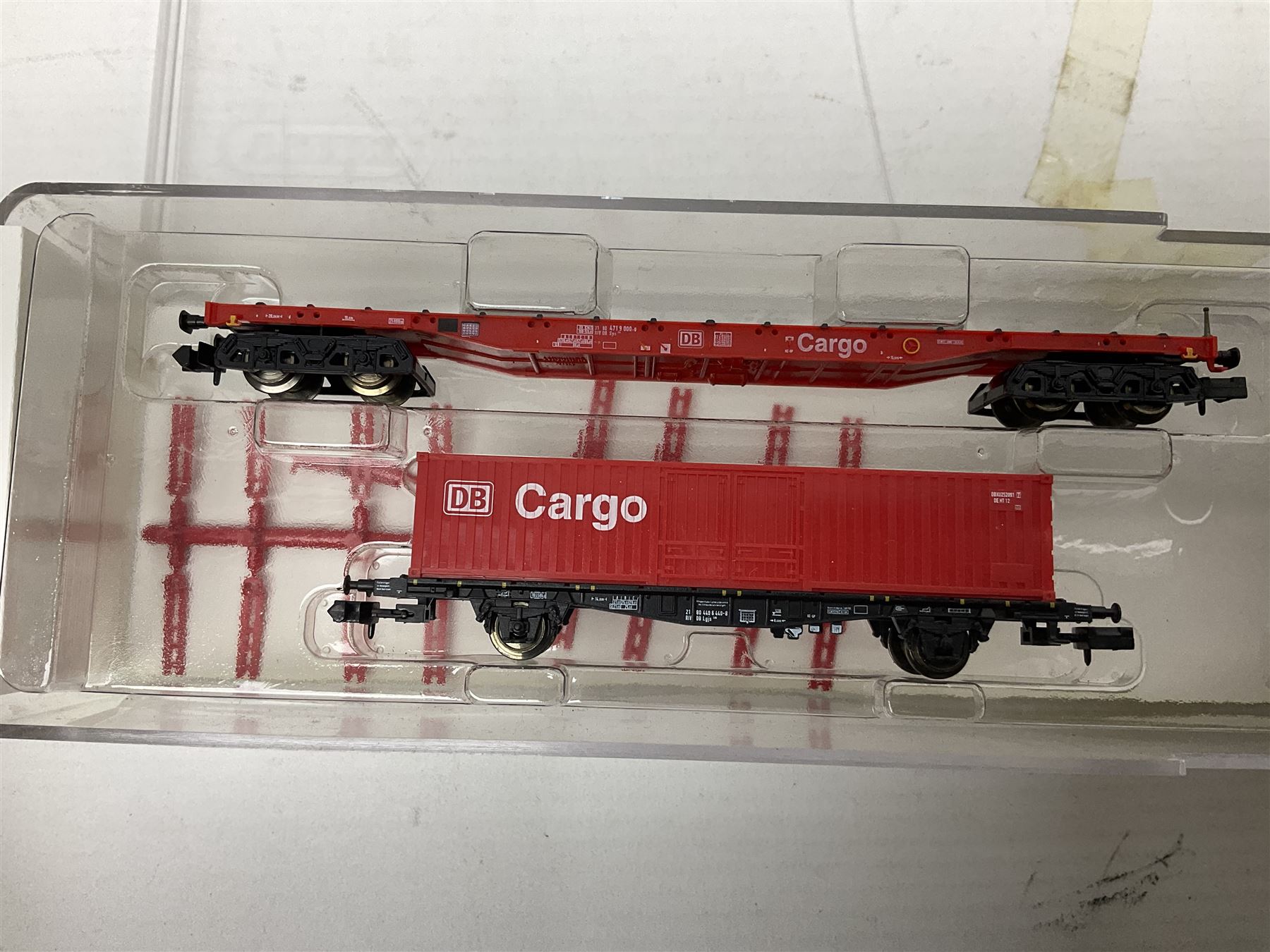 Trix Minitrix 'N' gauge - No.15272 DHL five-car set; boxed; and No.13982 set of three Cargo goods wagons; boxed (2)
