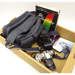  canon EOS 500 camera with 28-80mm lens, Canon EOS 1000F with Canon 80-200mm lens, Fotima camera bag, The Joy of Photography by the editors of Eastman Kodak Company & another book  