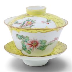 Famille jaune rice bowl, cover, and saucer, decorated with a bird in a blossoming branch, H10cm