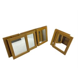 Ten oak framed rectangular mirrors, and a smaller oak framed mirror
