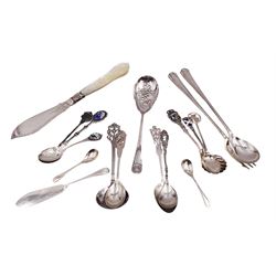 Group of silver flatware, including Victorian mother of pearl handled fish knife, modern silver serving fork and spoon, and a collection of other silver spoons including some continental examples, all hallmarked with various dates and makers