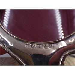 Six modern silver mounted photograph frames, to include an oval example, decorated with doves and green man masks, hallmarked W I Broadway & Co, Birmingham 1985, and a rectangular example with crossed golf club decoration, hallmarked Carr's of Sheffield Ltd, Sheffield 1994 etc, largest H24cm