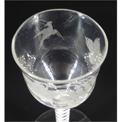 Late 18th century drinking glass, the ogee bowl etched with fruiting vines and bird in flight upon a double series opaque twist stem and conical foot, H15cm
