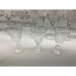 Part set of Stuart Crystal Salisbury pattern glass to include eleven wine glasses, eleven smaller, seven sherry, etc, with marks beneath, largest H18.5cm