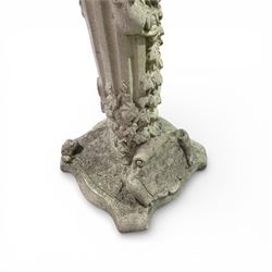 Cast stone bird bath on pedestal with cast iron water pump