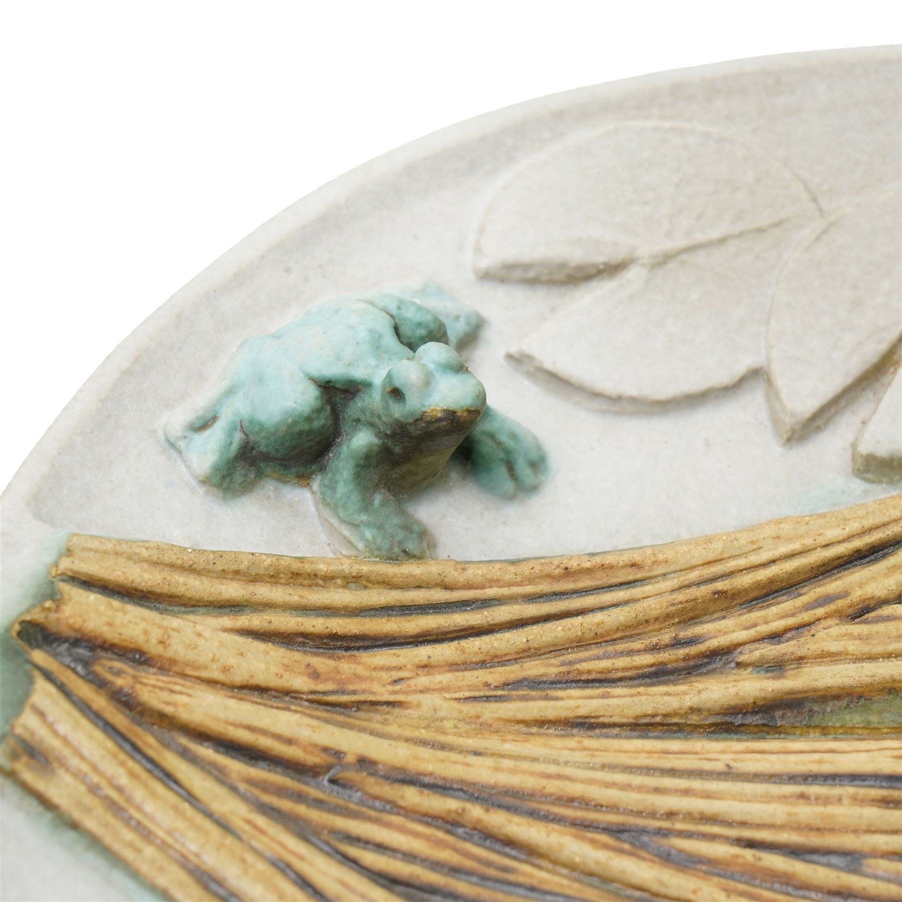 Bernard Rooke (1938-) - Studio pottery shallow dish with a raised pattern of lily pads, iris, frogs and dragon fly W31cm with Bernard Rooke paper label from The Mill Gallery, Swilland, Ipswich and incised 'B R' to the reverse