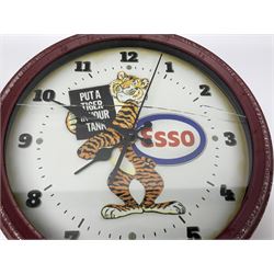 Esso Advertising Wall Clock, 'Put A Tiger In Your Tank', together with Jones & Co wall clock, largest example D40cm