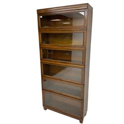 Globe Wernicke - oak six-tier library bookcase, enclosed by six glazed up-and-over doors, on square block feet