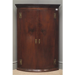  Victorian mahogany corner cabinet, projecting cornice, two cupboard doors enclosing three shelves, W67cm, H98cm, D46cm,   