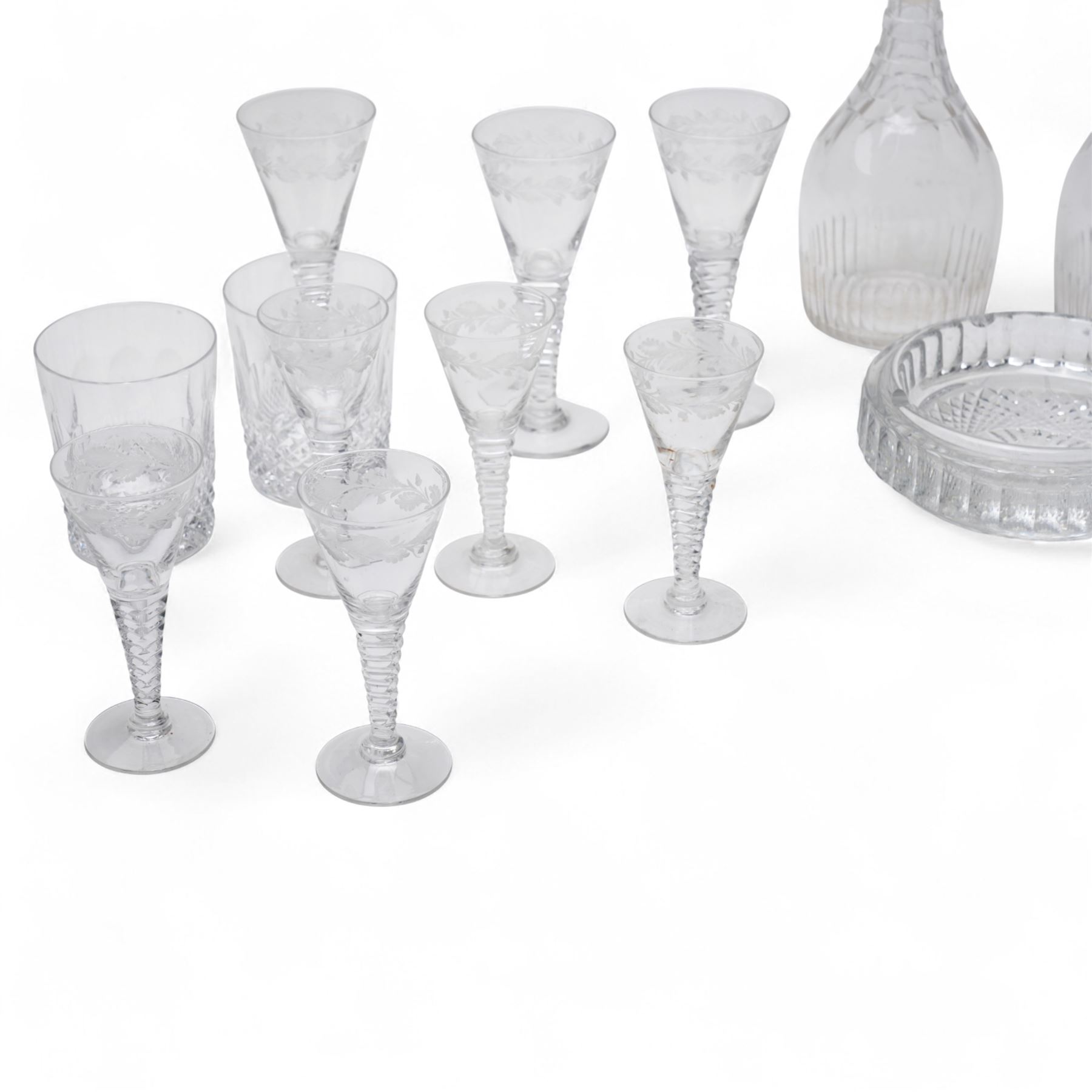 *Set of six Stuart crystal wine glasses with leaf etched decoration and cut tapering stems, nine smaller matching glasses, pair of Waterford Colleen tumblers, pair of smaller tumblers, pair of glass decanters and two glass ashtraysFrom the Kirkham Hall Attic & Cellar Collection, sold without reserve