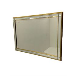 Rectangular gilt and beveled mirror framed wall mirror