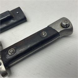 Austrian Model 1895 Carbine knife bayonet with 24.5cm fullered steel blade; various marks to the ricasso including F.G. GY.; cross-piece marked No.7843; in steel scabbard L37cm overall