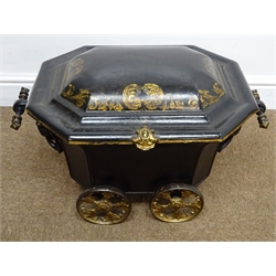  Regency Toleware coal wagon, elongated octagonal body with C scroll cast handles, stepped domed lid with chinoiserie scroll border and on four five spoke cast gilt wheels, W55cm, D37cm, H38cm, with tin liner  