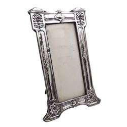 Art Nouveau silver mounted photograph frame, of rectangular form, with repousse decorated columns of floral and foliate detail, with easel style support verso, hallmarked J Aitkin & Son, Birmingham 1907