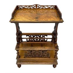 Victorian figured walnut étagère Canterbury, rectangular moulded top with raised scrolling fretwork gallery, two shaped and pierced supports on three division rack, turned supports and fretwork splats, cavetto moulded base with drawer, on turned feet